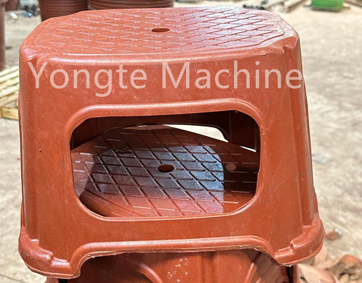 Yongte Plastic extrusion and molding machine is installed in Africa customer's factory for recycling plastic film wastage into plastic buckets,plastic basins and plastic chairs.